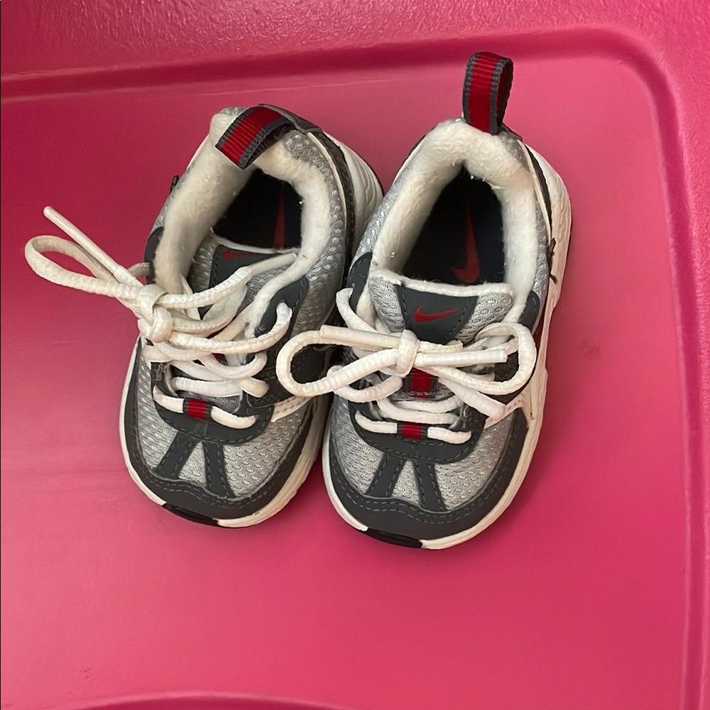 Nike Gray and Red Sneakers with Sporty Design